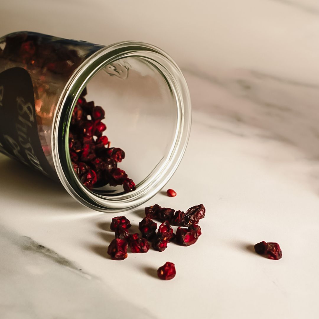 Shisandra berries in a glass jar