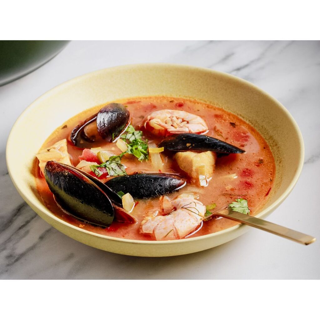 Bouillabaisse in yellow bowl