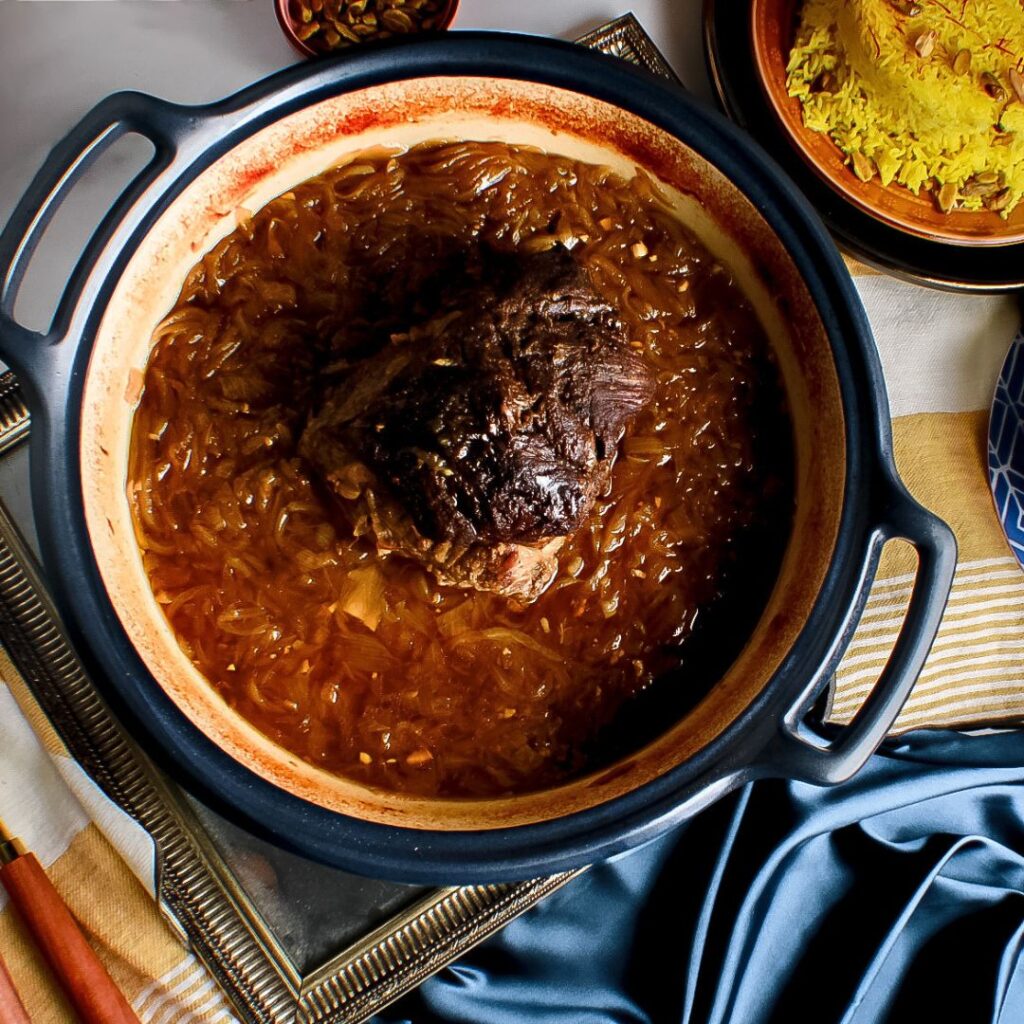 beef in pot with onions